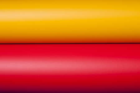 Colorful plastic film background in a rowの写真素材