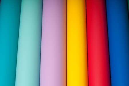 Colorful plastic film background in a rowの写真素材