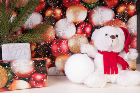 White teddy bear with presents and christmas toyの写真素材