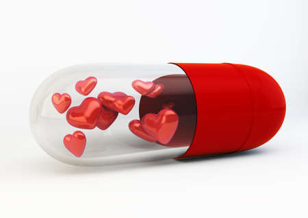 Red Love Pills inside capsule 3d Illustration isolated on white backgroundの写真素材