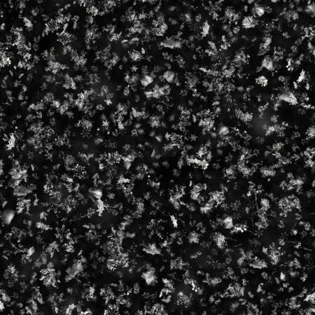 Seamless Snowflake Texture on Black Backgroundの写真素材