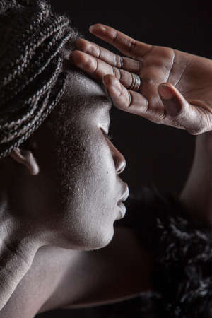 An emotional, African-American woman.
