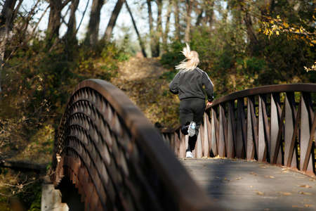Woman running for exercise.の写真素材