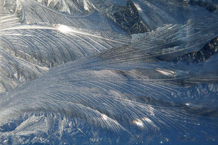 Ice crystals on window glassの写真素材