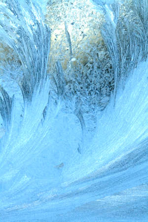 Ice crystals on window glassの写真素材