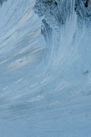 Ice crystals on window glassの写真素材