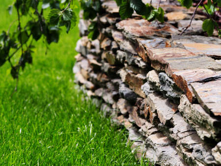 Slate garden wall. Garden stone wall.の写真素材