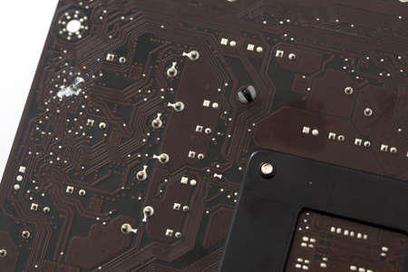 Close up and detail photo of computer circuit board, motherboard, computer component and port. Isolated on whiteの写真素材