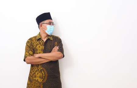 Asian man point to present an empty space of content. Advertising model concept.の写真素材