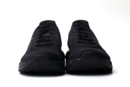Yogyakarta, Indonesia - June 19, 2022 : New Balance black shoes model. Isolated on white backgroundのeditorial素材
