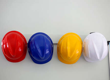 Disaster preparedness helmet hanging on a wallの写真素材