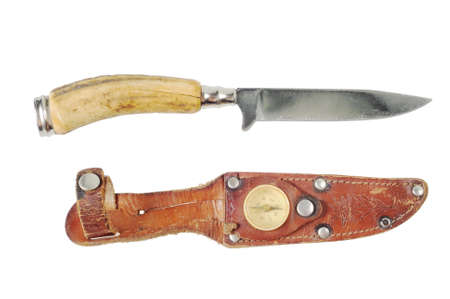 Vintage hunting knife with a bone handle and leather sheath. Isolated on white.