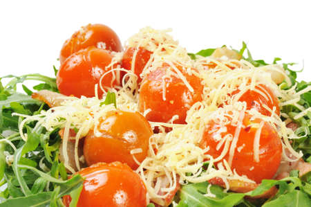 Salad with arugula and tomatoes. Isolated on white.の写真素材