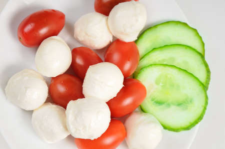 Diet salad with cherry tomatoes and mozzarella.の写真素材