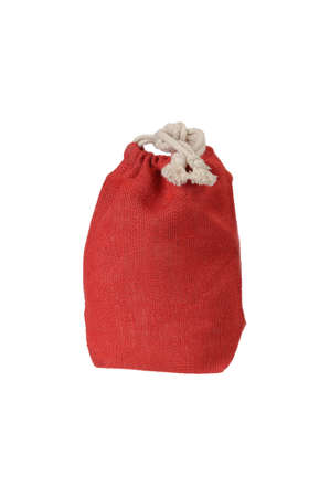 Red decorative rag bag with ropes for tying  Isolated on white の写真素材