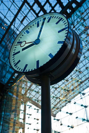 Round station watches with arrows close up