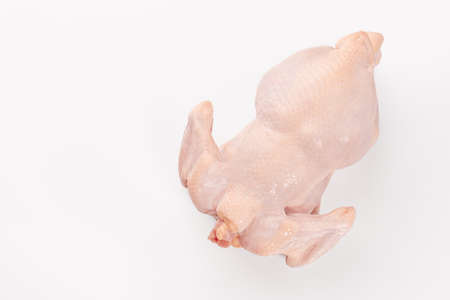 Top view of fresh raw chicken isolated on whiteの写真素材