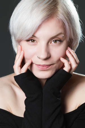 Close up studio portrait of a pretty blonde womanの写真素材