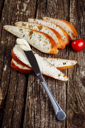 Sliced Lavash, Georgian bread and butter on wooden board