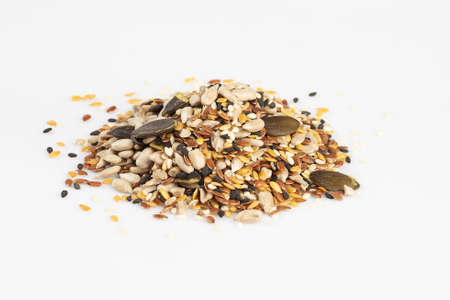 Raw seeds mix isolated on white background.の写真素材