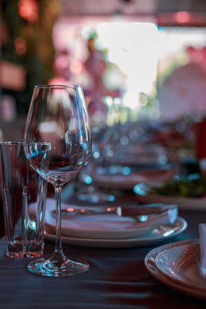 Wine glasses in a restaurant setting.の写真素材