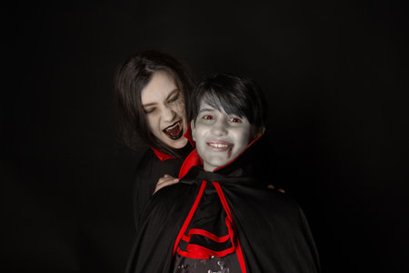 Vampire Halloween Concept - Portrait of handsome children in Vampire halloween costume, studio portraitの写真素材