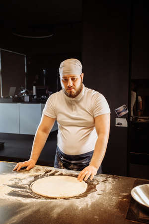 Making dough by hands at bakery or at home.