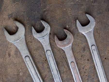 Four wrenches put togsther on ground の写真素材