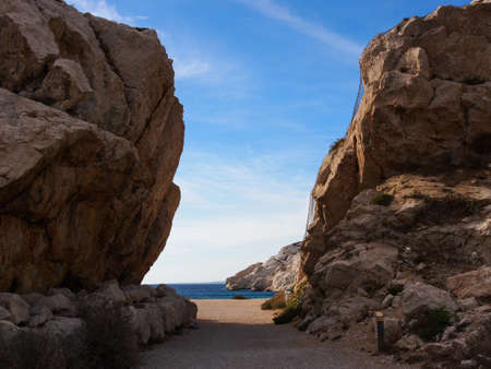Rocky arch a way to Mediterranean sea  in Chateau d