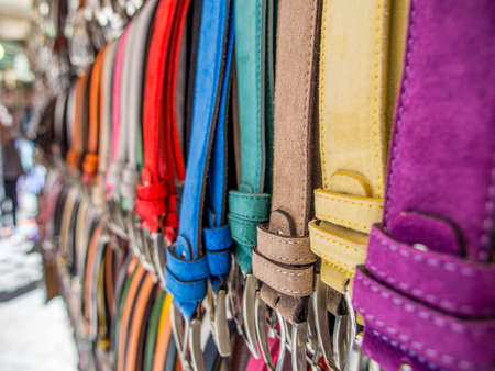 Belts in a market in Rome in summer.の写真素材