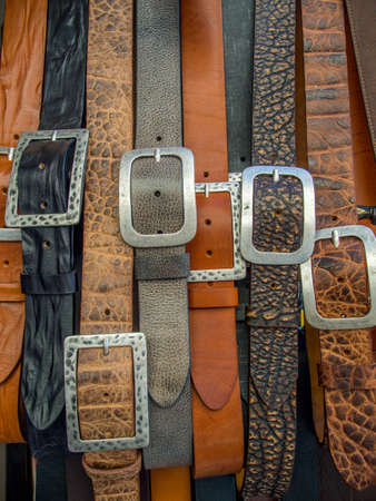 Belts in a market in Rome in summer.