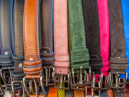 Belts in a market in Rome in summer.の写真素材
