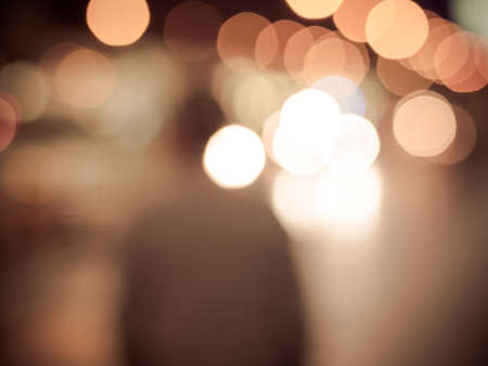 Man waiting for a taxi by the road in blur , out of focus.の写真素材