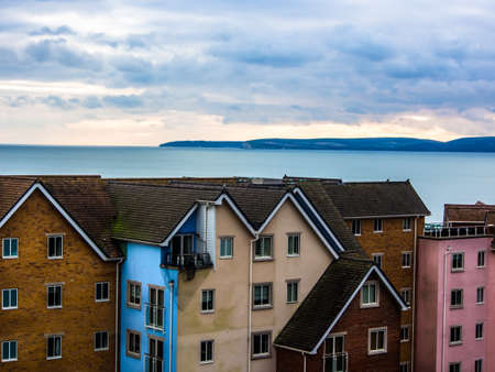 Houses by the sea in UK.の写真素材