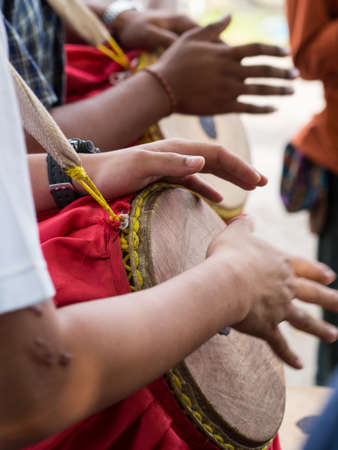 drummers are playing thai style drums in a wedding ceremony.の写真素材