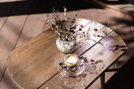 Eucalyptus and coffee on the wood tableの写真素材