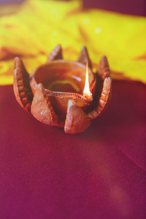 Happy Diwali - Diya lamps lit during diwali celebration