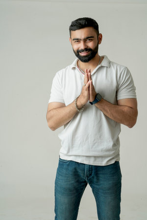 Handsome young guy posing in studio - isolatedの写真素材