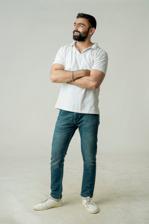 Handsome young guy posing in studio - isolatedの写真素材