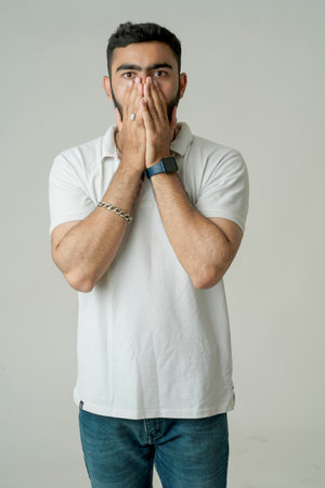 Handsome young guy posing in studio - isolatedの写真素材