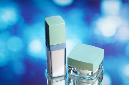 cosmetics bottle on waterの写真素材