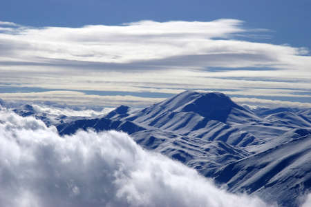 Bright white Clouds and snow mounains (Turkey)