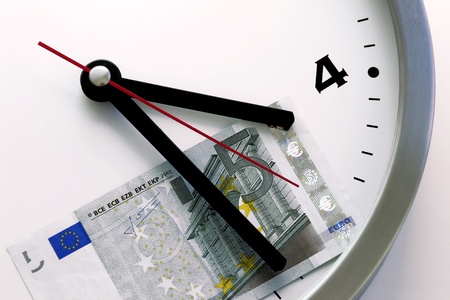 hands wall clock is shown on the bill at â¬ 5の写真素材