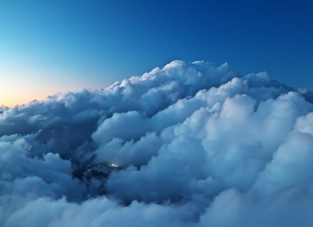 far mountains with blue haze and clouds (sunset or sunset)