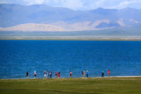 Visitors beside the Qinghai lakeの写真素材