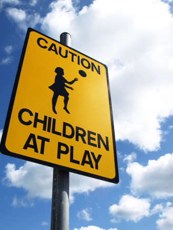 yellow preventive sign about children at playの写真素材