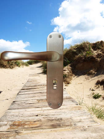 metallic door lock isolated on background of nature     の写真素材