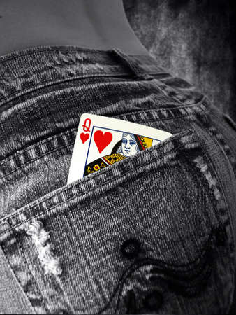 queen of hearts in a jeans pocketの写真素材