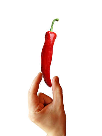 hand with red pepper, isolated on white background