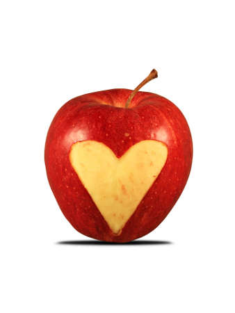 red apple with a heart shape ,against white backgroundの写真素材